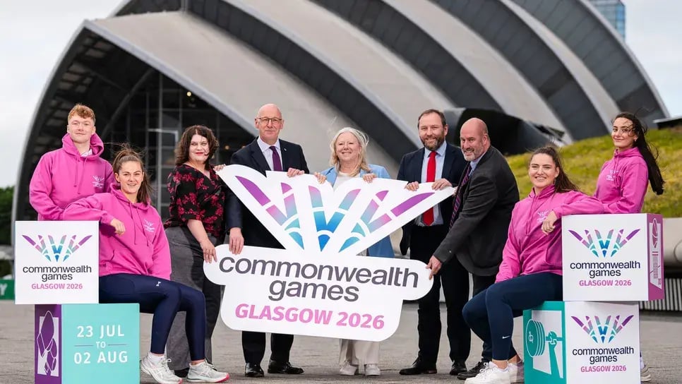 Commonwealth Games Glasgow 2026 official launch with athletes and officials holding event signage outside the Armadillo venue, Glasgow Scotland. Image credit: Commonwealth Sport News.