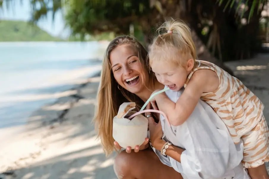 Mom-and-daughter-drinking-coconut