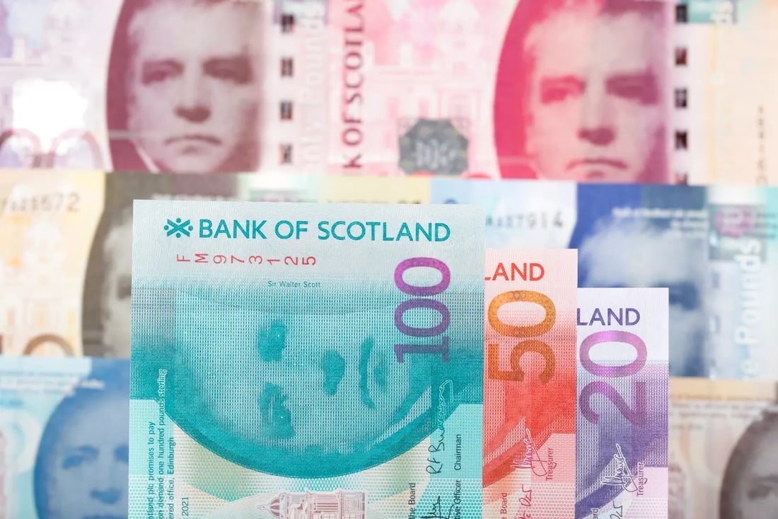 Close-up of Bank of Scotland banknotes in various denominations