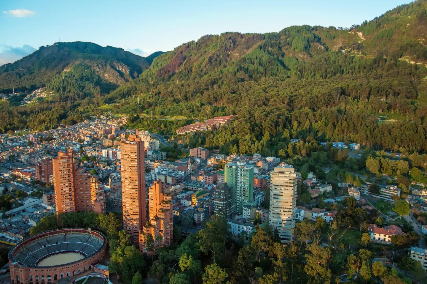 Green hillside overlooking Medellín's skyline, Colombia