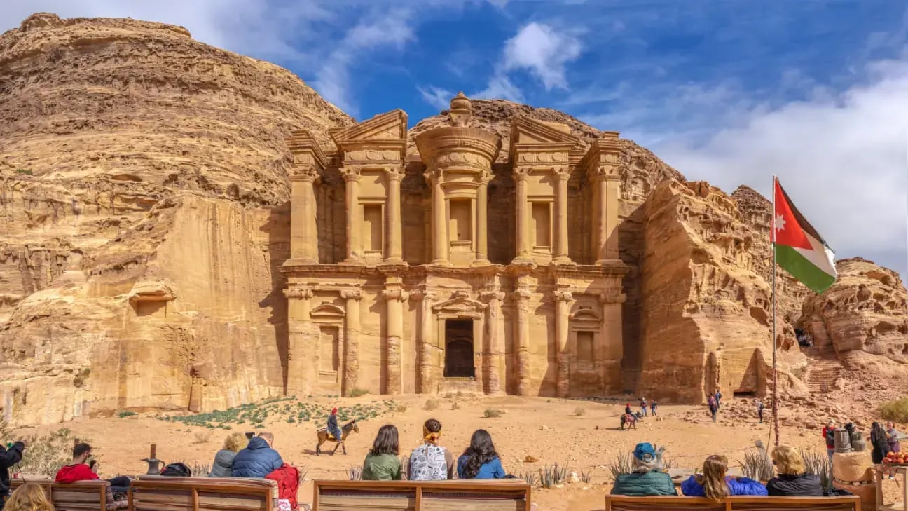The Monastery at Petra viewed from the seating area, with Jordanian flag visible