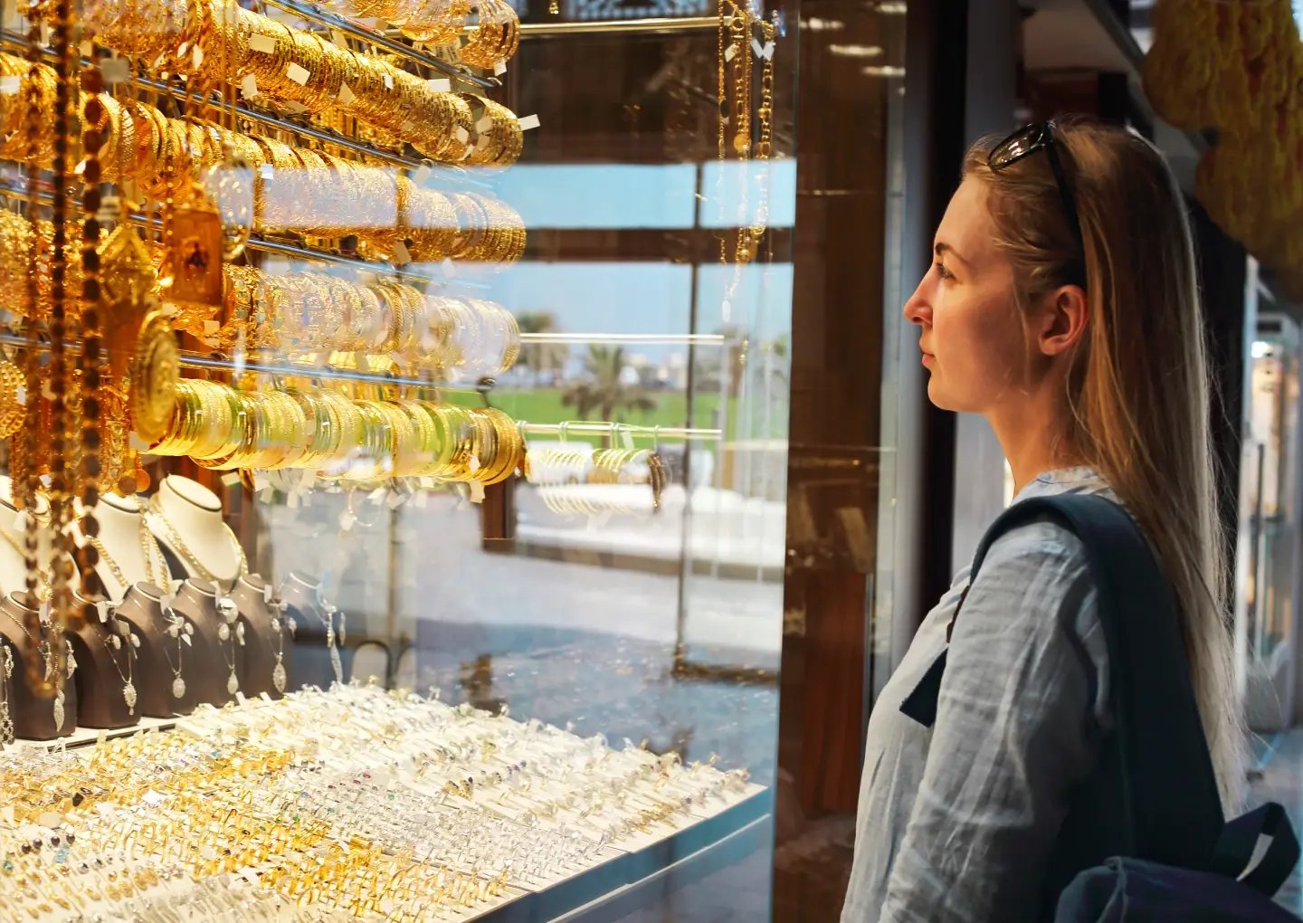 Visitor viewing pre-Hispanic gold artefacts at the Museo del Oro in Bogotá, Colombia