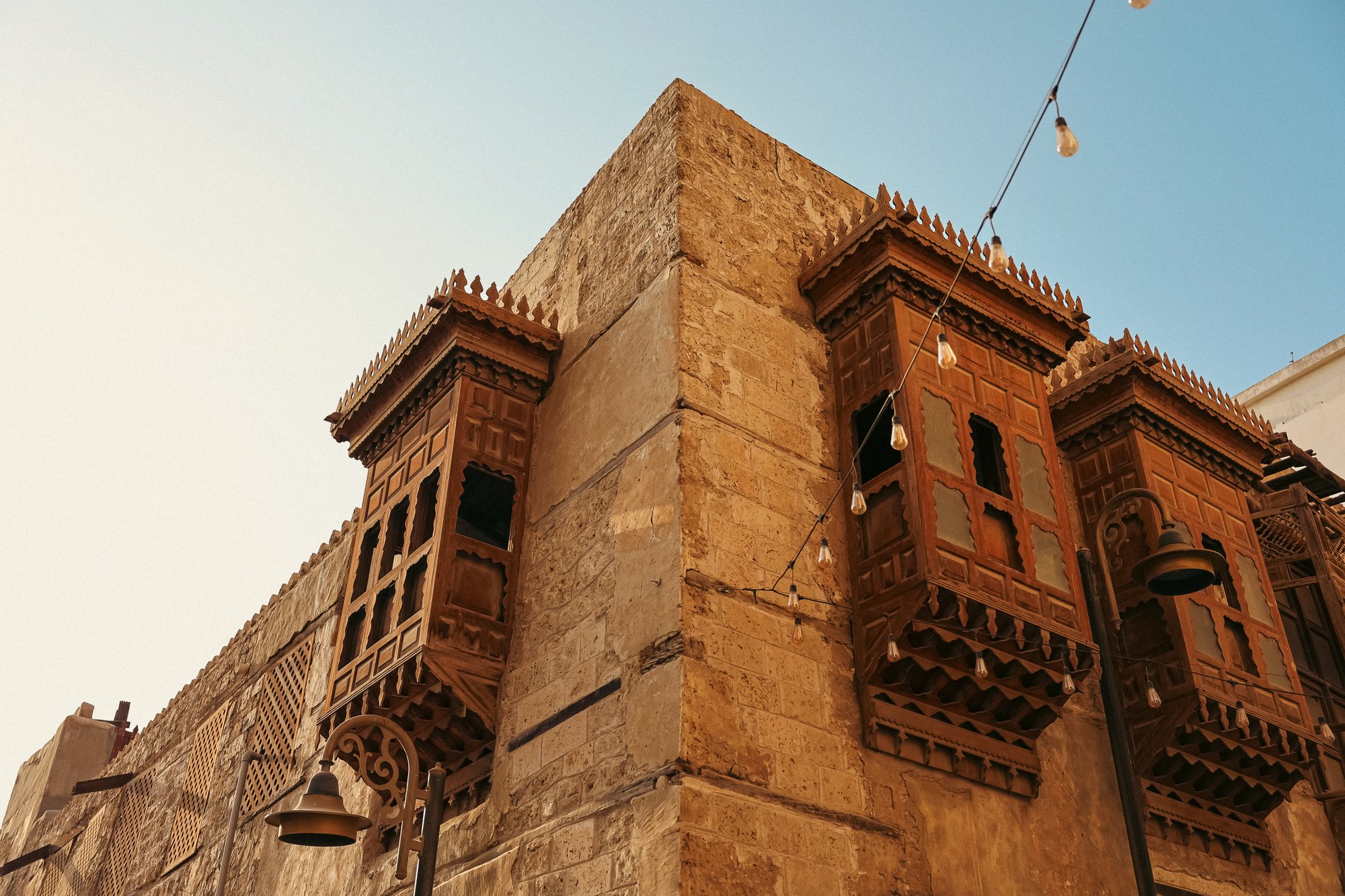 Coral-stone building with carved wooden balconies in Al-Balad, Jeddah