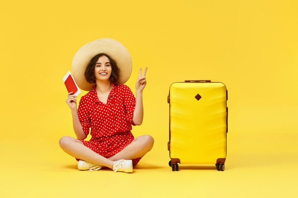 women-with-passport-yellow-background2